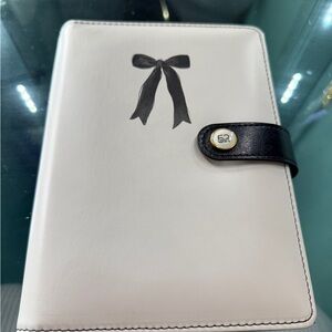 Elegant White and Black Notebook with Bow Design